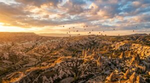 Aerial view of Cappadocia landscape showing fairy chimneys and rocky terrain