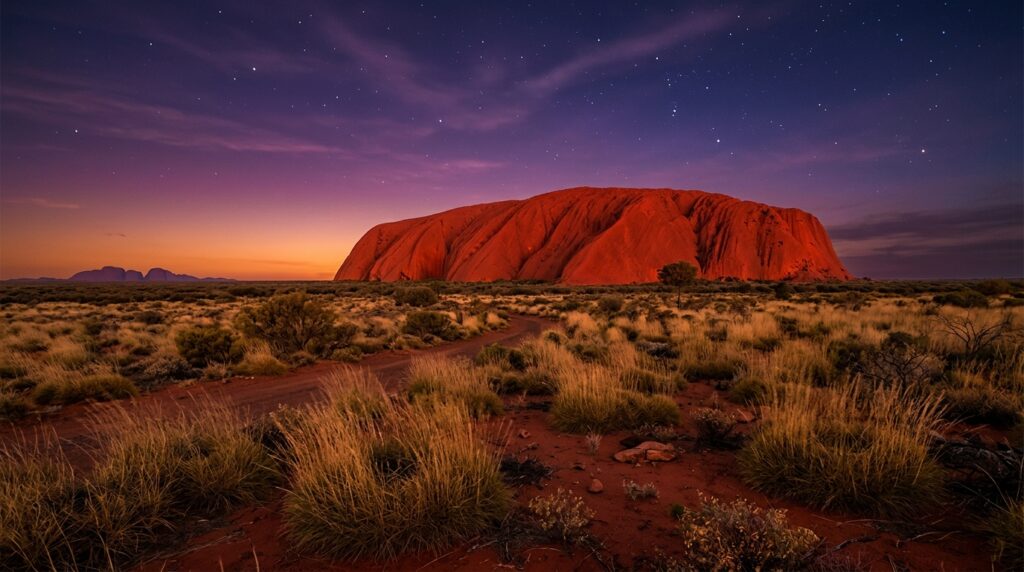 Uluru glowing red at sunset in Australia's Red Centre